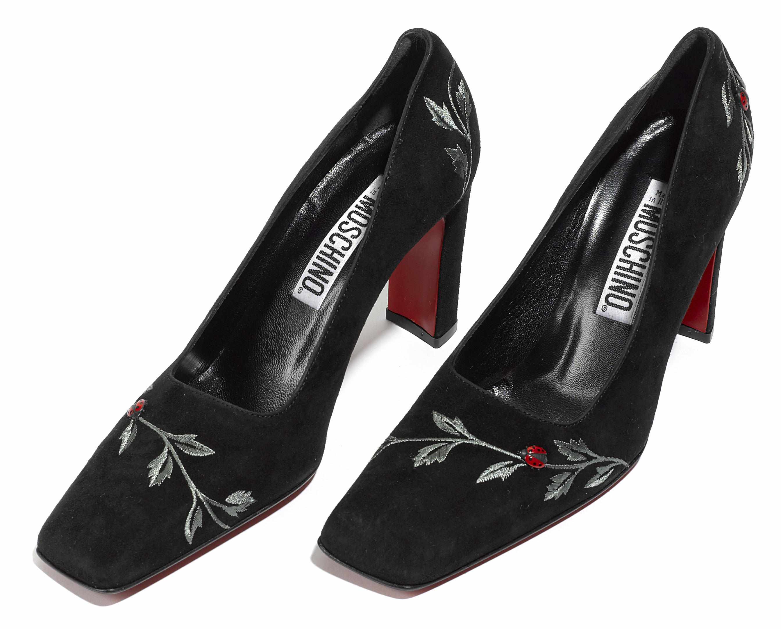 Appraisal: A pair of Moschino embroidered black suede heels size