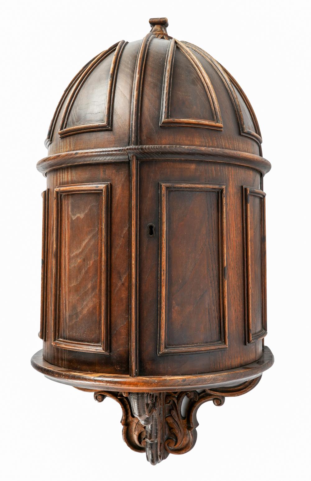 Appraisal: WALNUT WALL-MOUNTED CABINETsemi-circular with domed top over two hinged doors