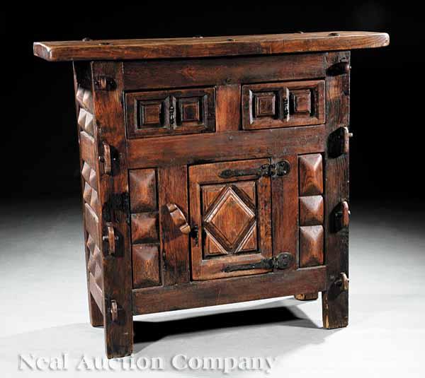 Appraisal: A Baroque-Style Carved Elm Cabinet antique and later with mortise