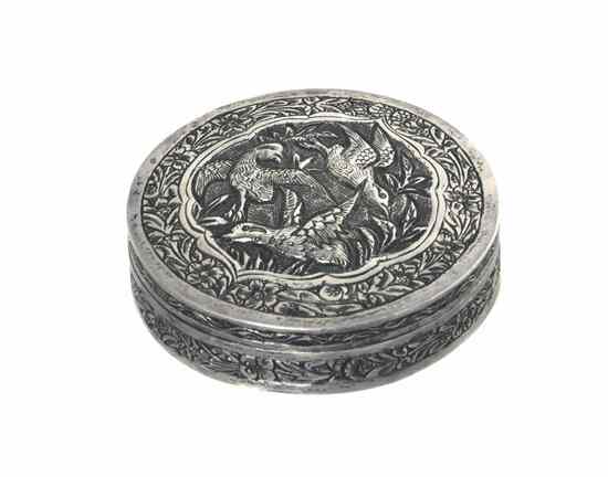 Appraisal: A Chinese Repousse Decorated Silver Box of circular form with