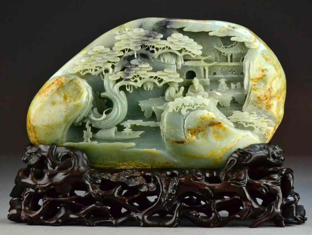 Appraisal: Large Impressive Chinese Carved Jade BoulderFinely carved on both sides