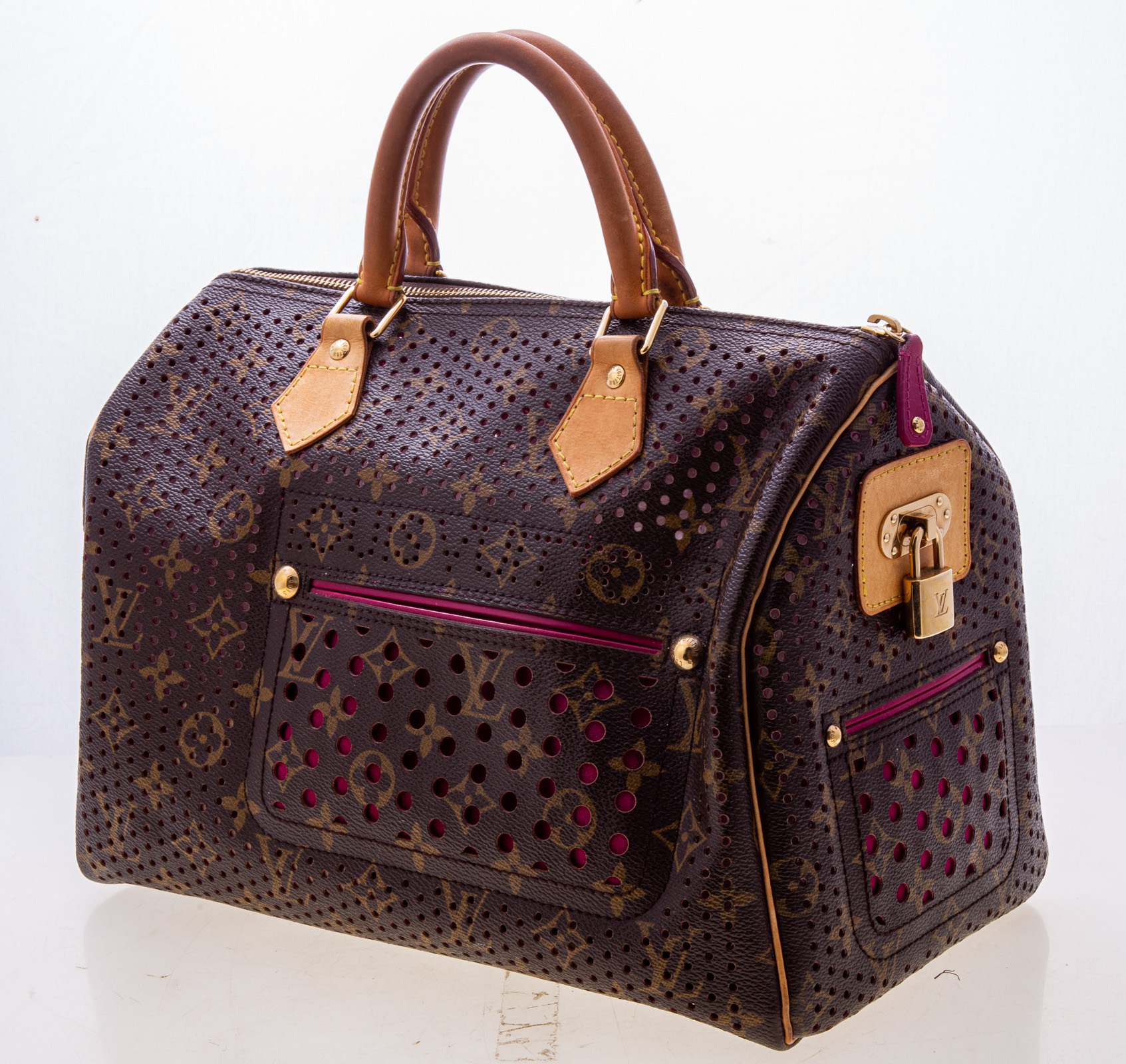 Appraisal: LOUIS VUITTON MONOGRAM CANVAS HANDBAG magenta suede interior includes dust