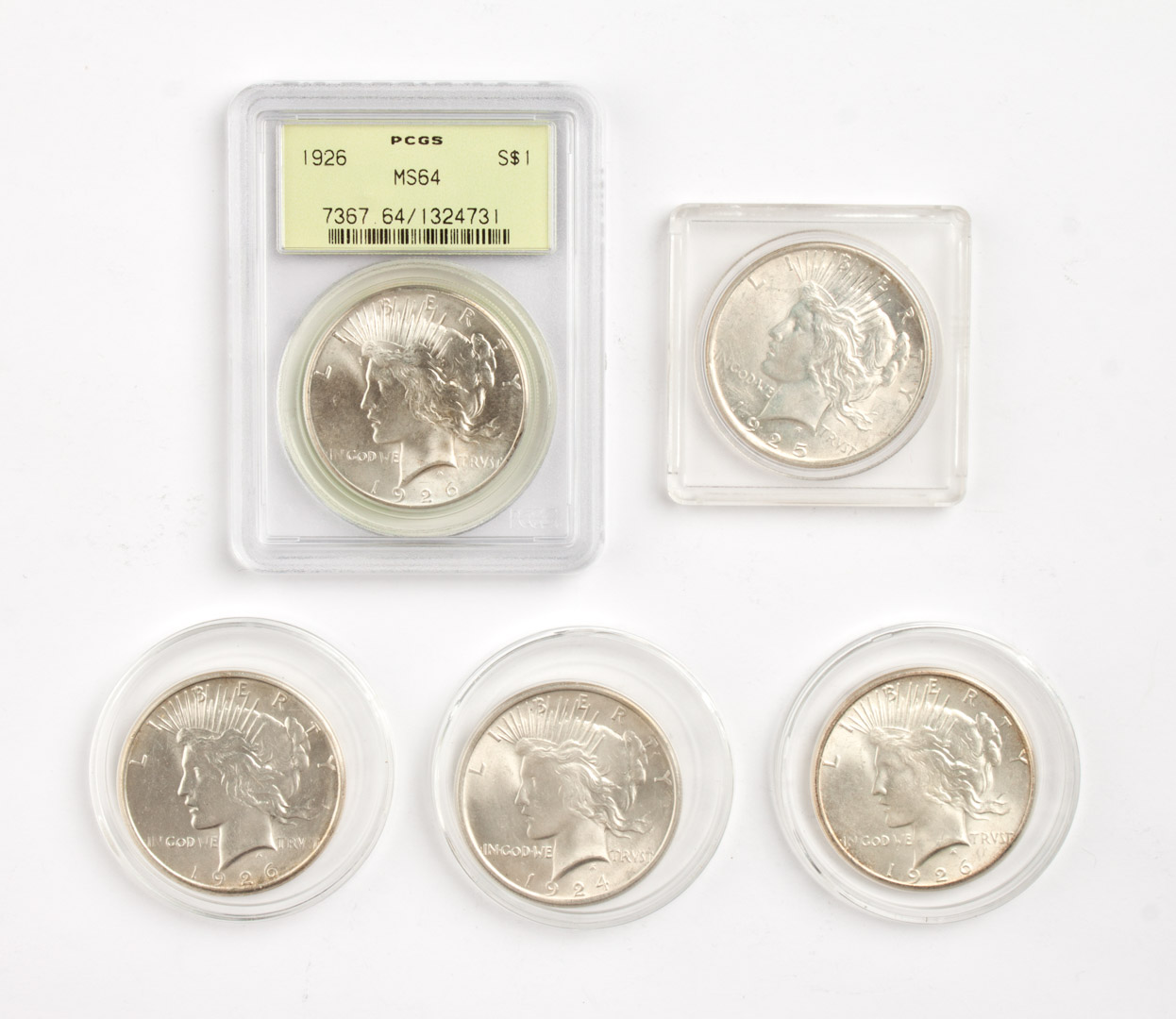 Appraisal: Five U S Peace type silver dollars -' comprising MS-