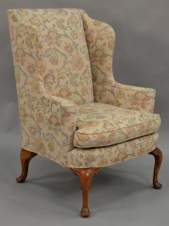 Appraisal: Queen Anne style upholstered wing chair Queen Anne style upholstered