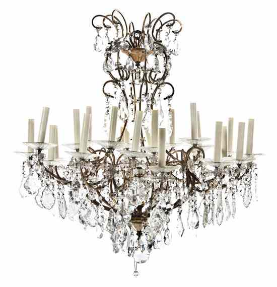 Appraisal: A Continental Brass and Glass Twenty-Four-Light Chandelier of caged form