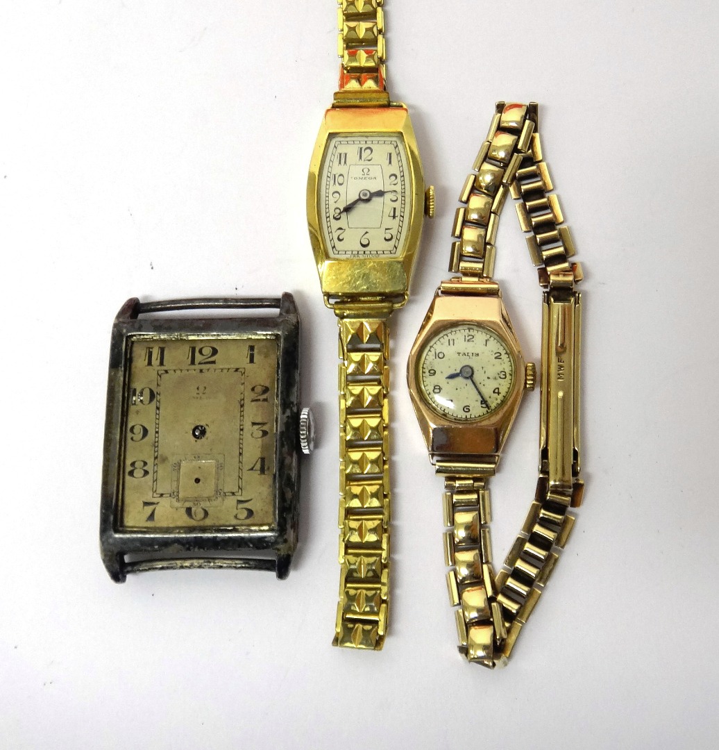 Appraisal: A lady's gold oval cased Omega wristwatch the signed silvered