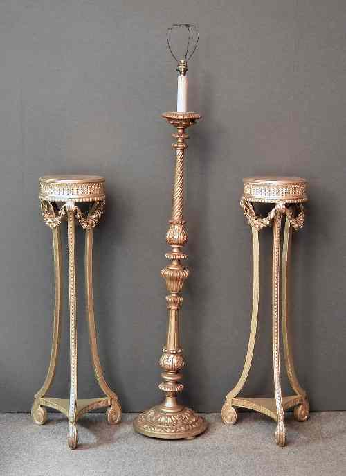 Appraisal: A pair of gilt circular torcheres of classical design the