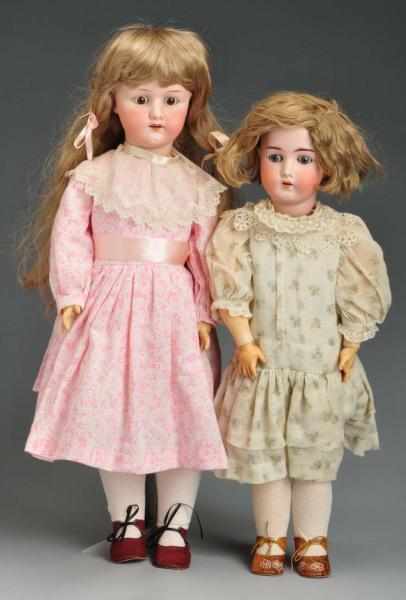 Appraisal: Lot of German Bisque Child Dolls Description Both with bisque