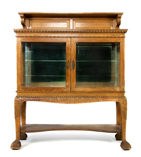 Appraisal: An American Oak Display Cabinet the shelved superstructure over two