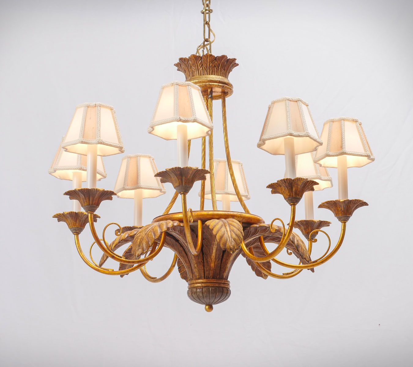 Appraisal: CHELSEA HOUSE GILDED PALM ARM CHANDELIER Sold with beautiful silk