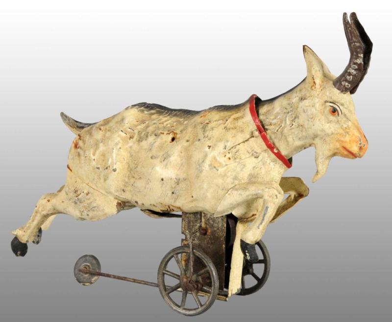 Appraisal: Tin Hand-Painted Goat Wind-Up Toy Description German Working When wound