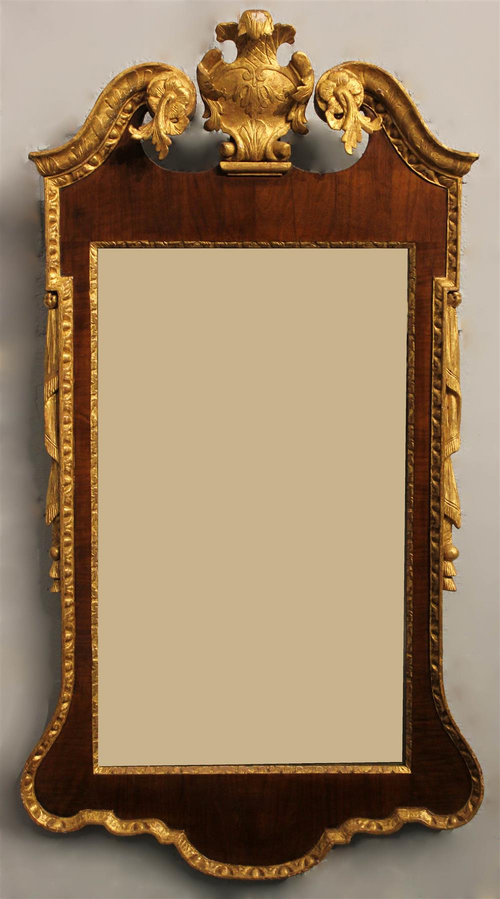 Appraisal: GEORGE II WALNUT AND PARCEL GILT WALL MIRROR CIRCA having