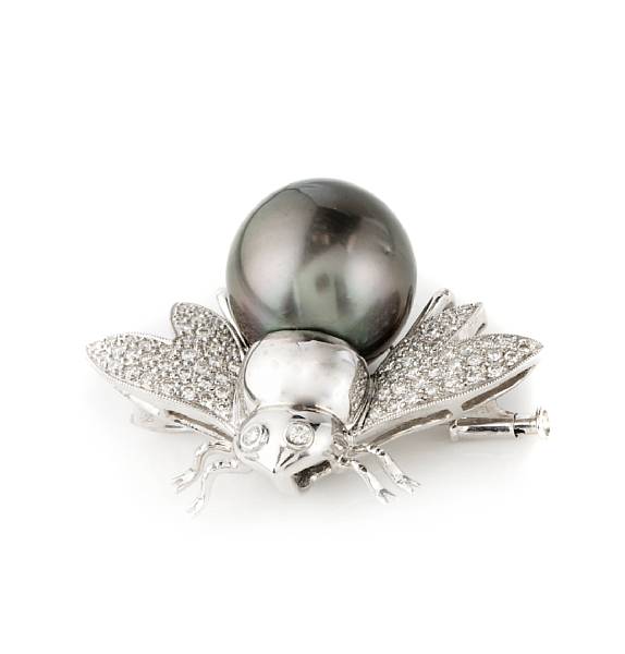 Appraisal: A cultured black pearl diamond and k white gold bee