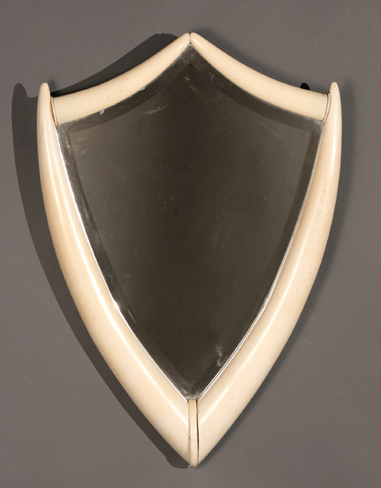 Appraisal: Belgian Art Deco Ivory Tusk Shield-Form Mirror Labeled A Gason