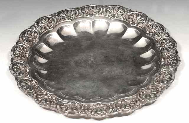 Appraisal: A VICTORIAN SILVER DISH with scroll and pierced border and