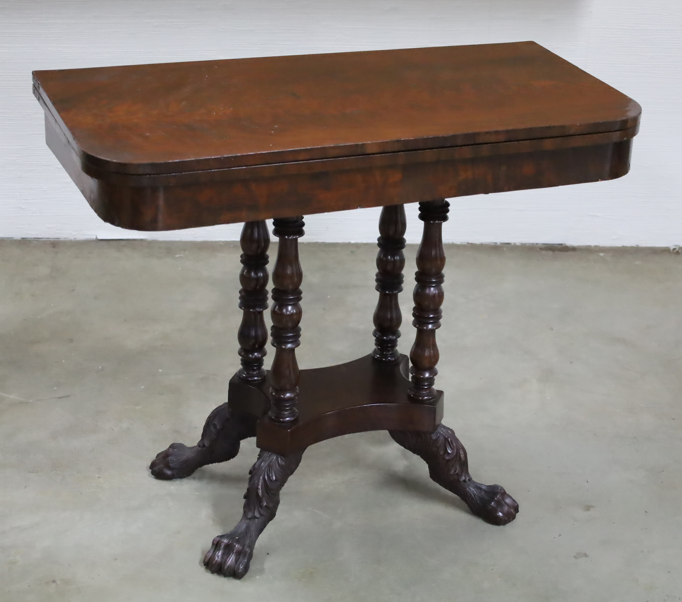 Appraisal: AMERICAN COLONIAL REVIVAL GAMES TABLE American Colonial Revival games table