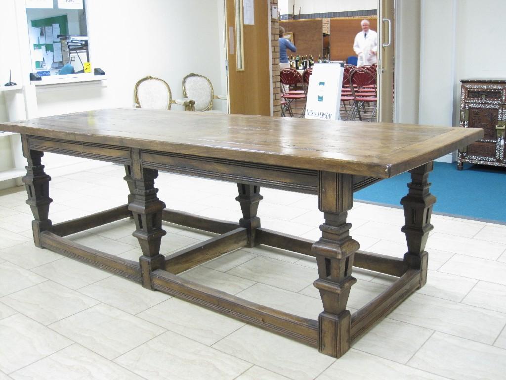 Appraisal: A th Century style oak and elm Dining Table with