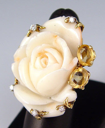 Appraisal: K CARVED CORAL DIAMOND AND CITRINE RING K yellow gold