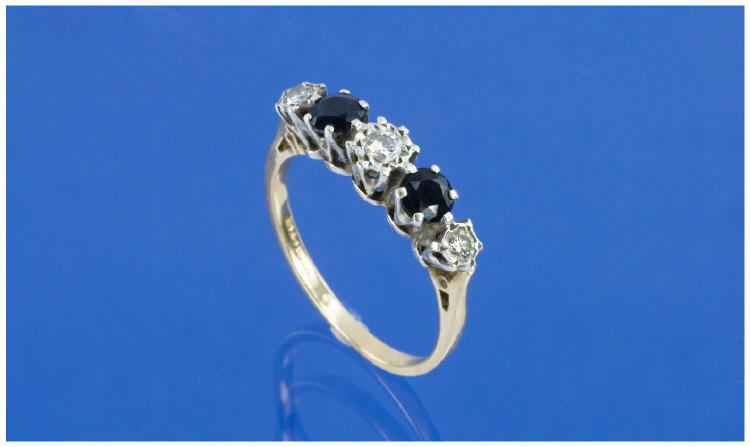 Appraisal: ct Gold Sapphire And Diamond Ring Two Round Faceted Sapphires