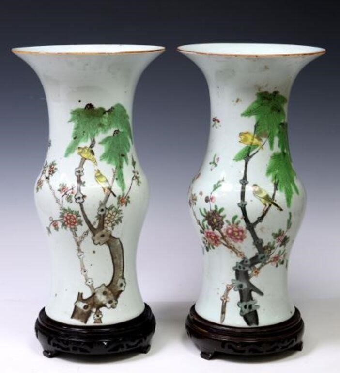 Appraisal: CHINESE ENAMELED PORCELAIN VASES ON STANDS lot of Chinese enameled