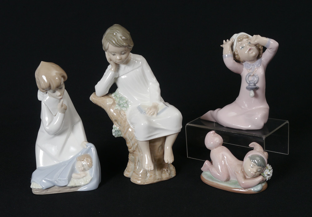 Appraisal: LLADRO PORCELAIN FIGURINES Angel with Child Juan Huerta sculptor issued