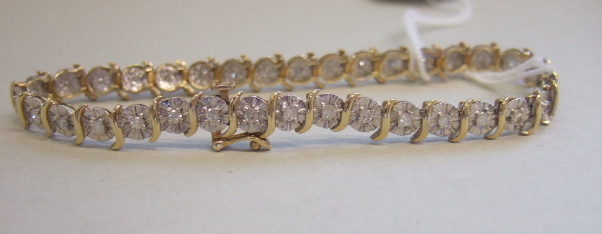 Appraisal: A ct gold and diamond set bracelet mounted with circular