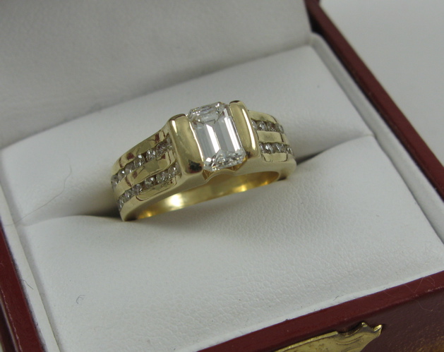 Appraisal: DIAMOND RING WITH APPRAISAL K yellow gold setting featuring an