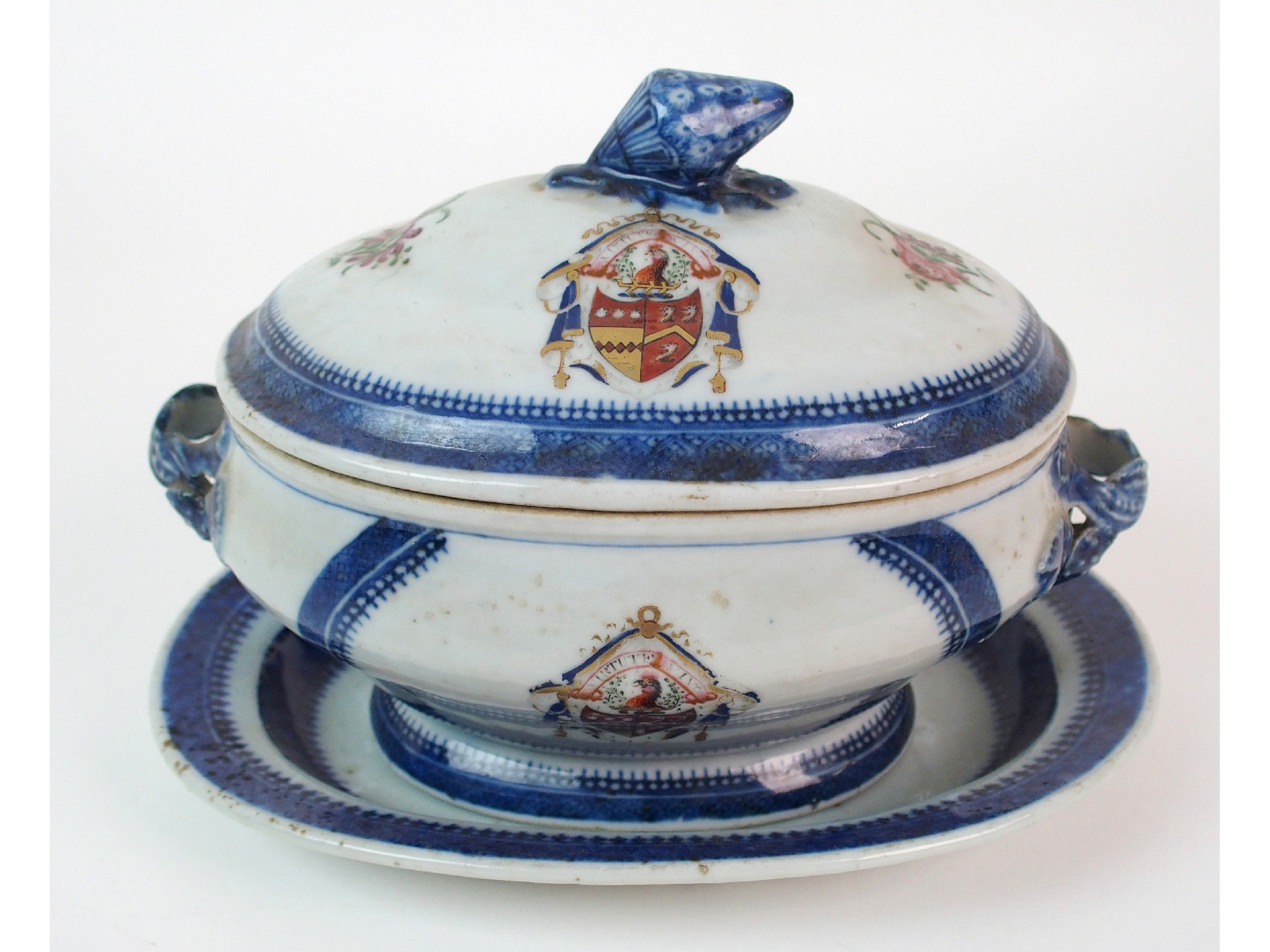 Appraisal: A Chinese armorial export sauce tureencover and stand painted with