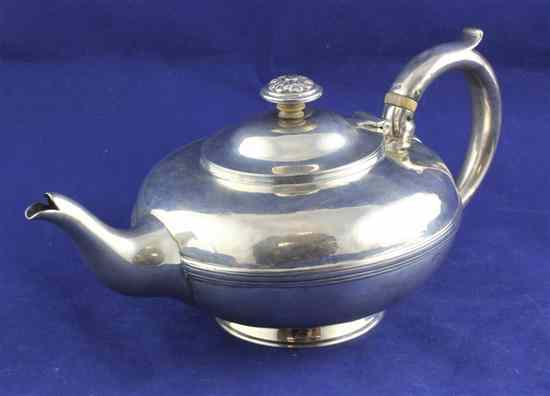 Appraisal: A William IV silver teapot of squat circular form with