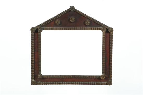 Appraisal: TRAMP ART FRAME Early th century pine Architectural form with