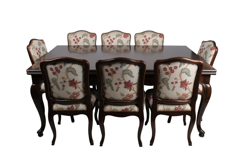 Appraisal: PROVINCIAL STYLE WALNUT DINING SETcomprising one table eight crewel-upholstered side