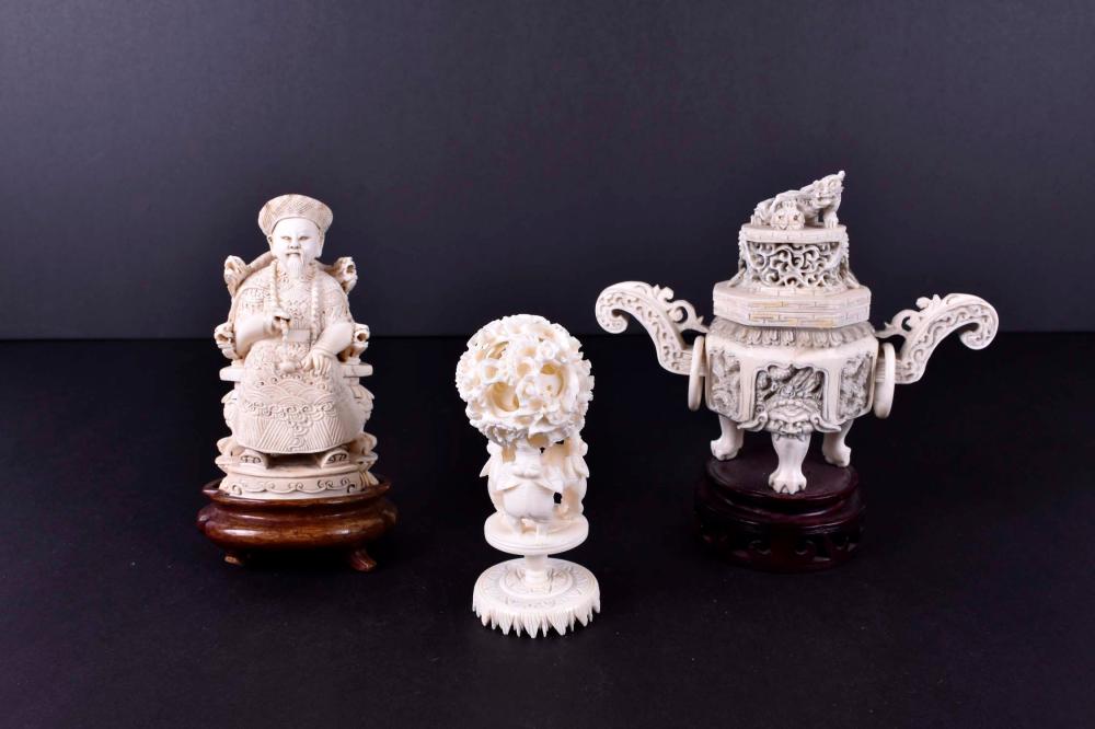 Appraisal: THREE CHINESE CARVED OBJECT STUDIESComprising a puzzle ball on elephant