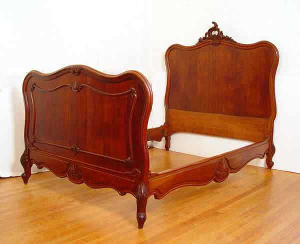 Appraisal: COUNTRY FRENCH CARVED OAK BED Double size bed stead the