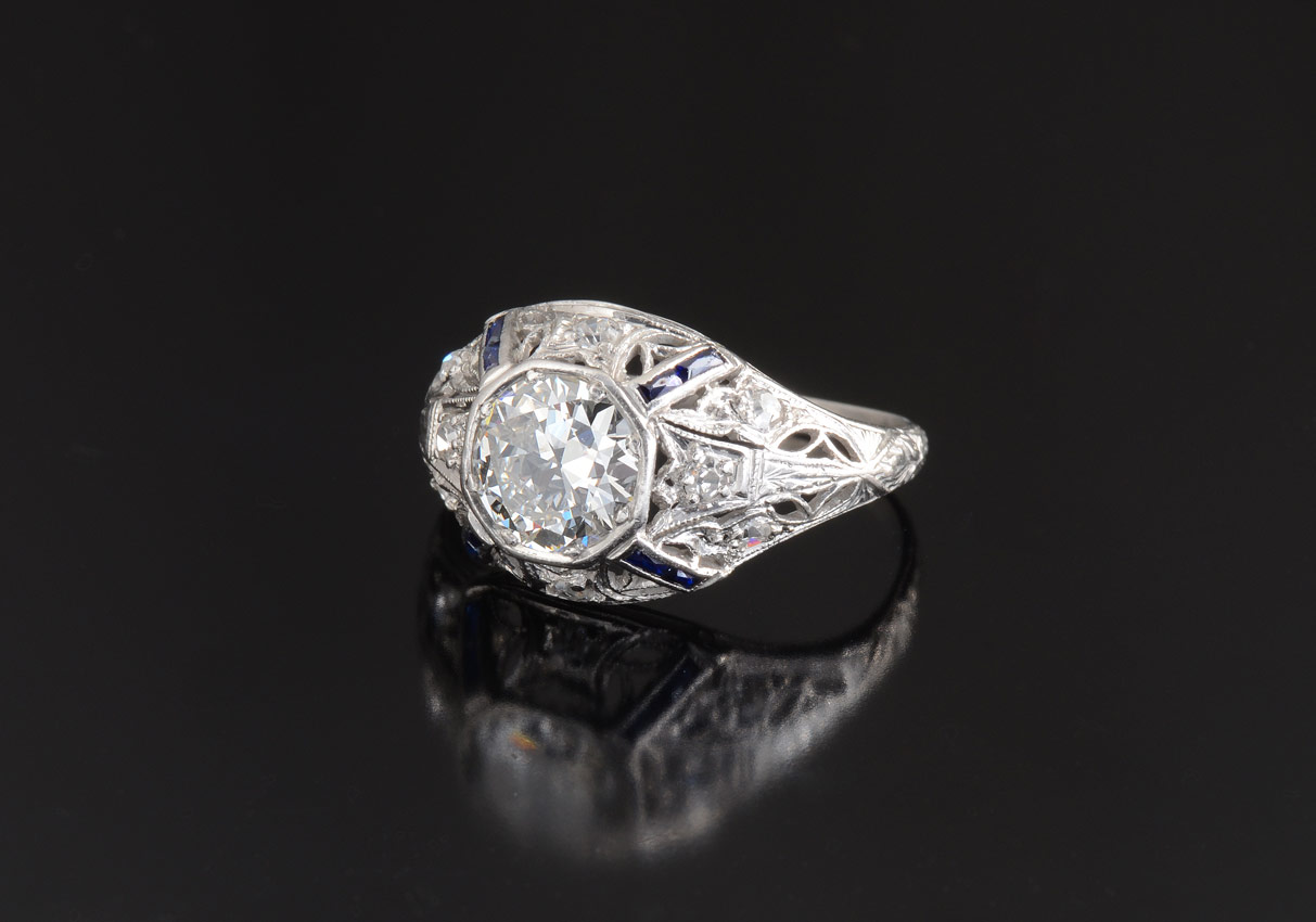 Appraisal: ART DECO PLATINUM DIAMOND RING Platinum filigree ring centers an