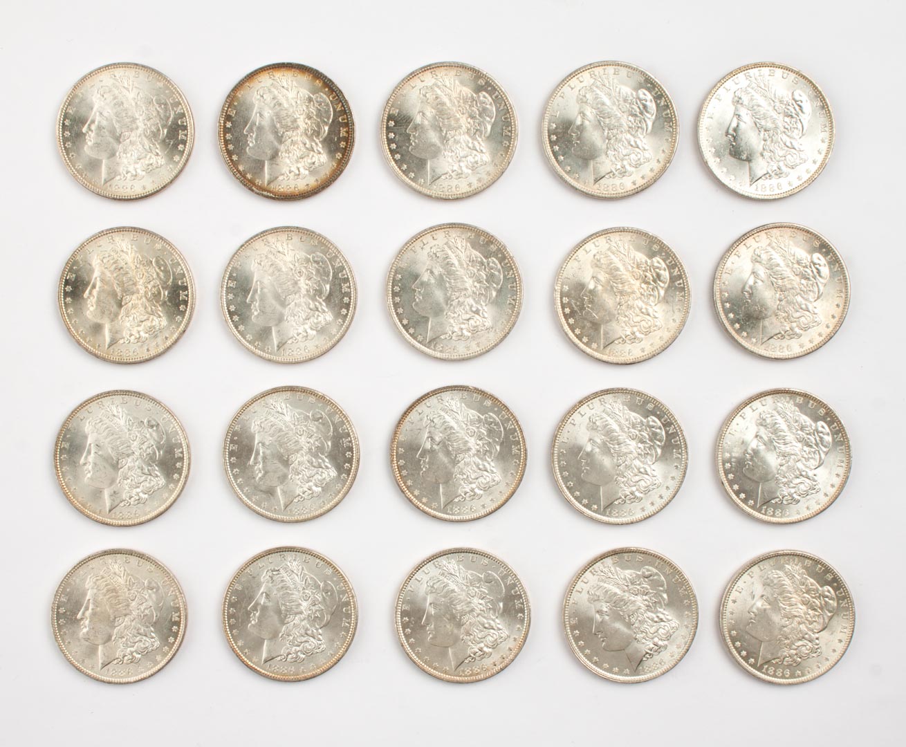 Appraisal: Twenty U S Morgan type silver dollars MS- and better