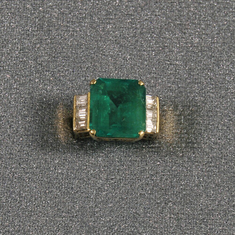 Appraisal: kt Gold Emerald and Diamond Ring the central emerald-cut stone