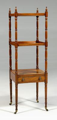 Appraisal: Regency mahogany etag egrave re three tiers with turned supports