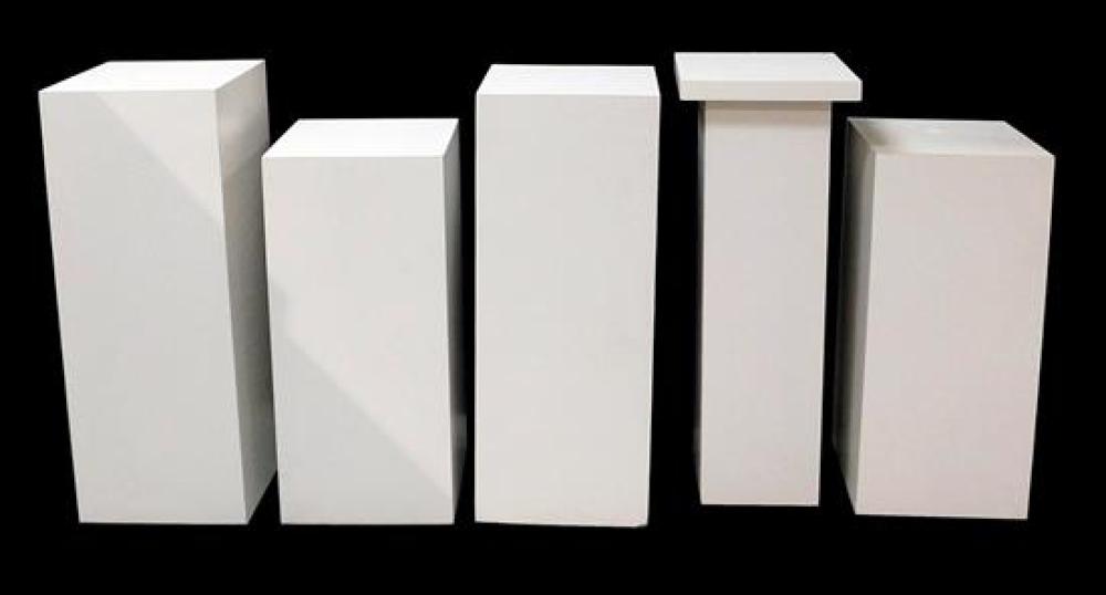 Appraisal: Five white pedestals for art display laminate finish varied sizes