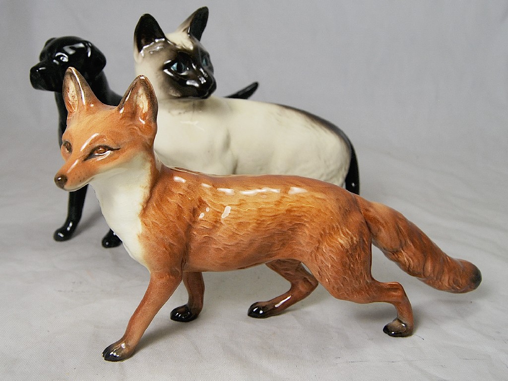 Appraisal: Three Beswick figures - Labrador 'Solomon of Wendover' black gloss