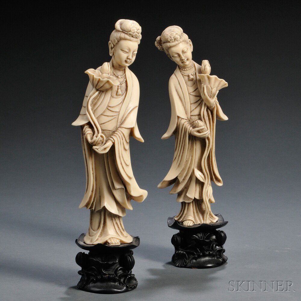 Appraisal: Pair of Faux Ivory Figures of Women on Wood Stands