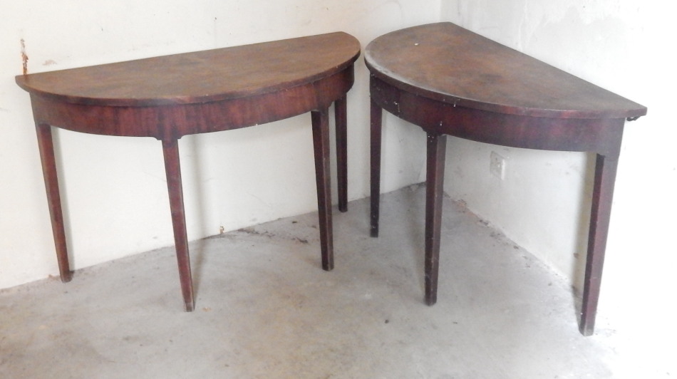 Appraisal: A pair of George III mahogany dining table D-ends of