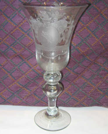 Appraisal: ANTIQUE ENGLISH ETCHED GLASS STEMMED GOBLET Of flaring form finely