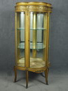 Appraisal: VITRINE French Louis XV style s gilded wood vitrine triple