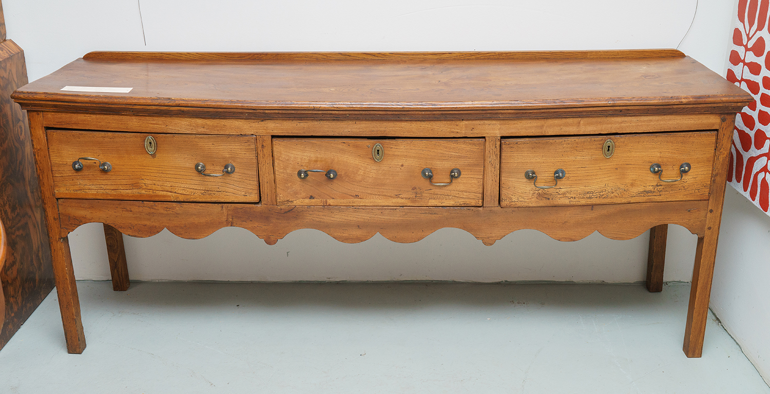 Appraisal: A th CENTURY ENGLISH OAK DRESSER Three central drawers with