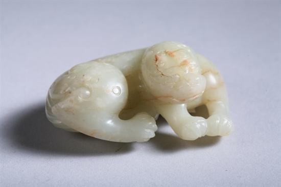 Appraisal: CHINESE CELADON JADE FIGURE OF TIGER The stone with russet