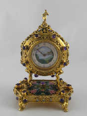 Appraisal: A fine gilt metal mantel clock the hexagonal base on