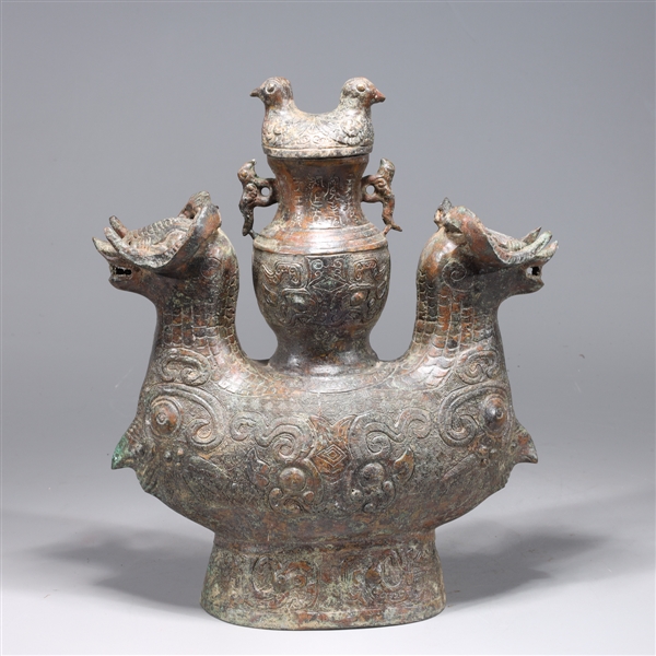 Appraisal: Chinese archaistic bronze double-form covered vase with various animal forms