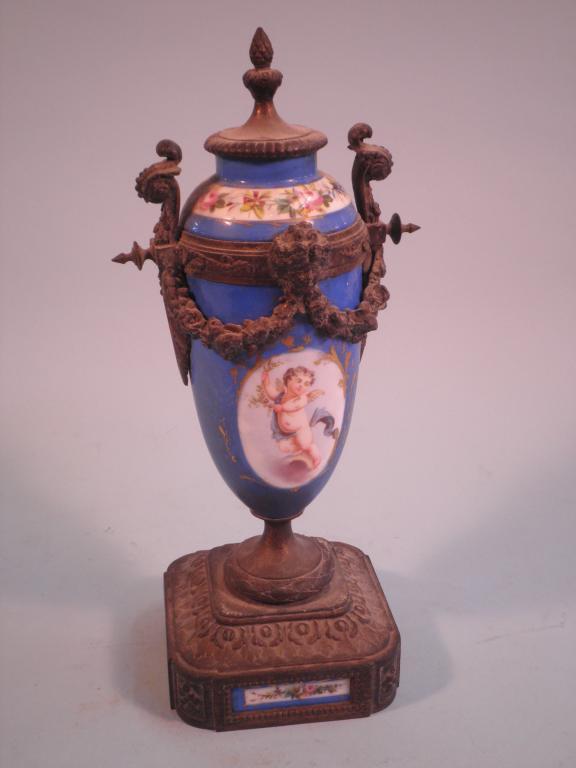 Appraisal: A late thC French gilt metal urn with porcelain mounts