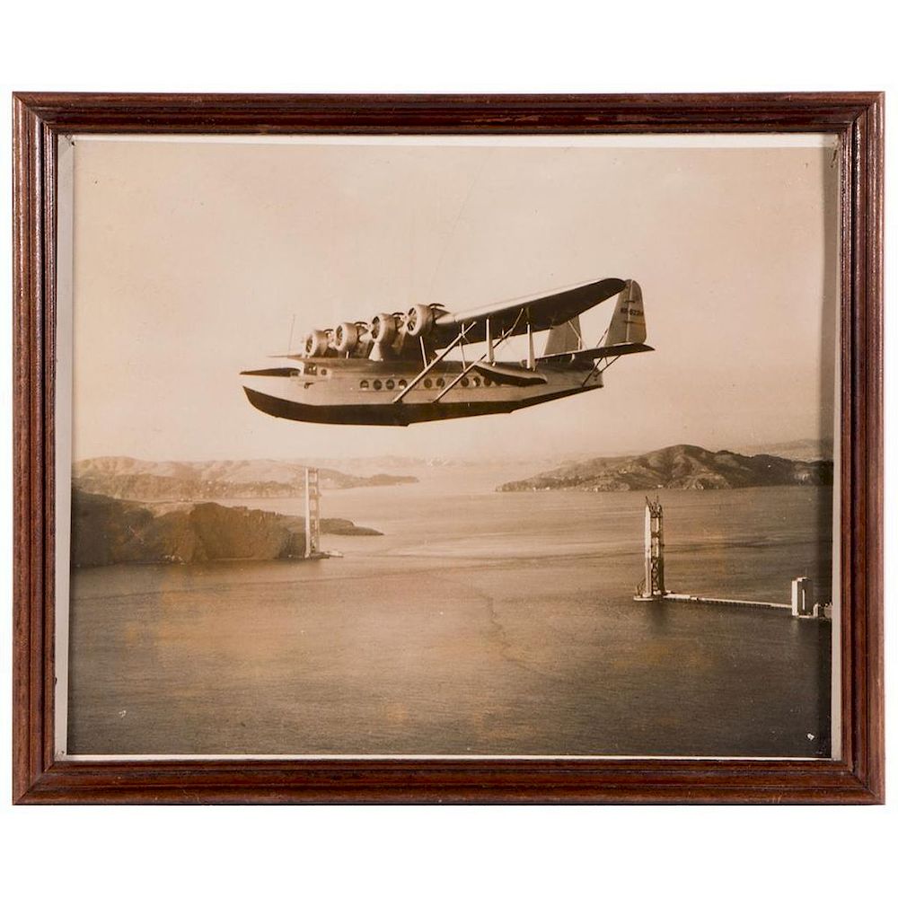 Appraisal: Period photo of a China Clipper over Golden Gate Bridge