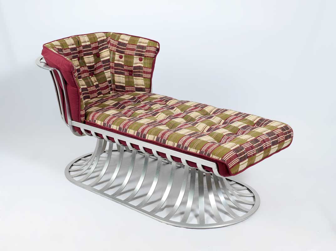 Appraisal: RUSSELL WOODARD ALUMINUM CHAISE LOUNGE Aluminum ribbed body flared head